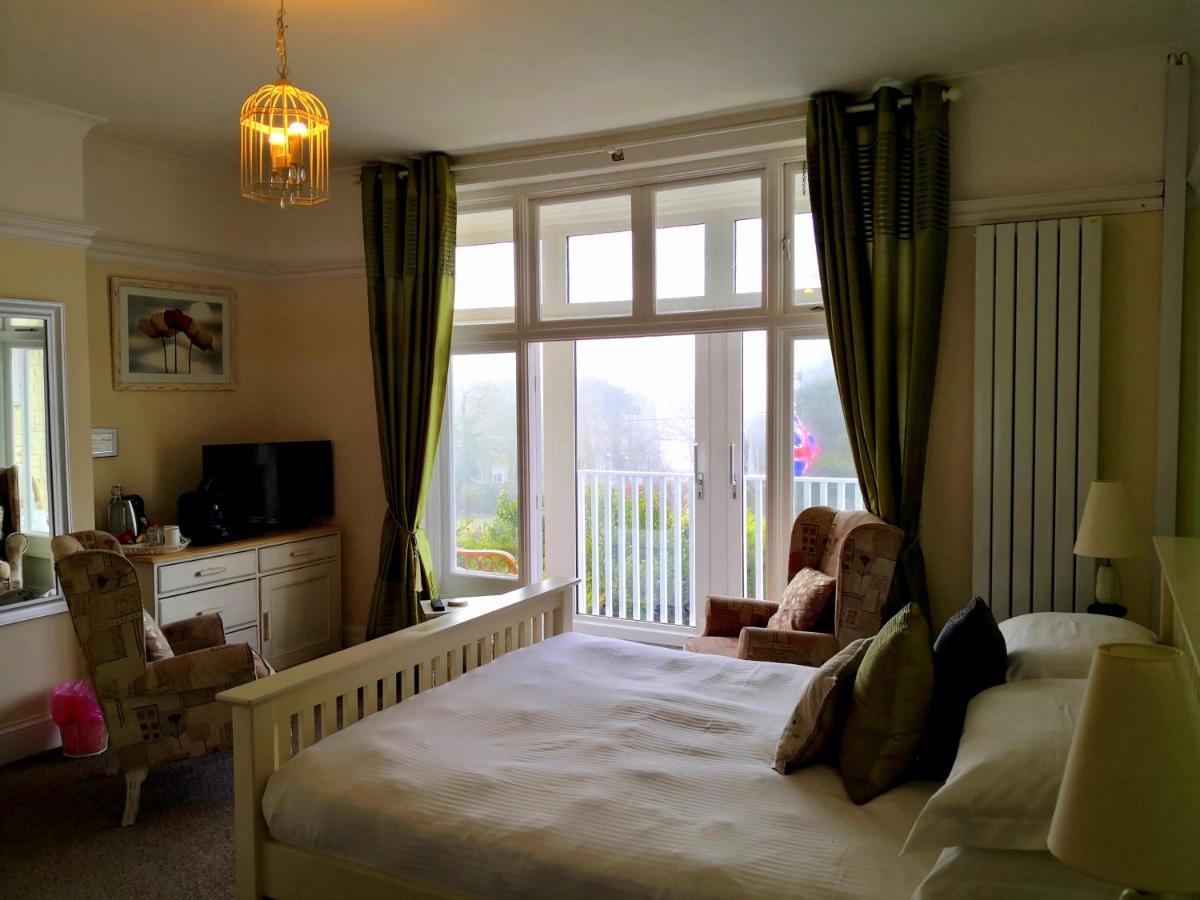 Sunset Guest House Ганстантон Екстер'єр фото A bedroom at the hotel