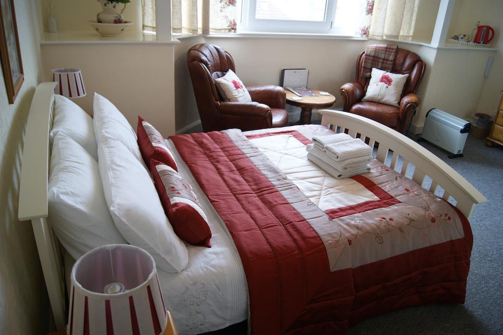 Sunset Guest House Ганстантон Номер фото A bedroom at the hotel