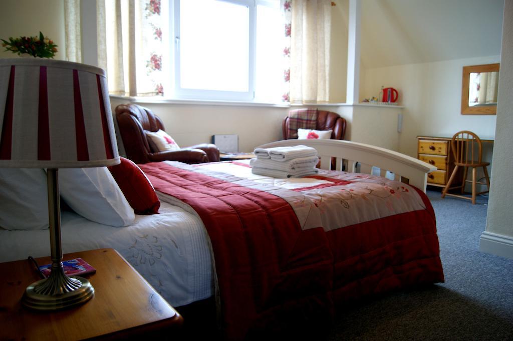 Sunset Guest House Ганстантон Номер фото A bedroom at the hostel